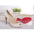 White patent leather peep toe pump