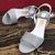 Pouching imported leather sandals