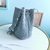 CRYSTAL CLOQUE NAPPA LEATHER BUCKET BAG