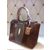 Calf hair leather handle bag