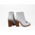 White patent leather short boot