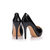 Black patent leather peep toe pump