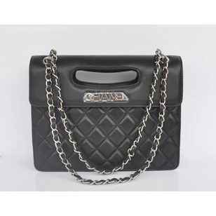 Leather handle bag with metal chain strap