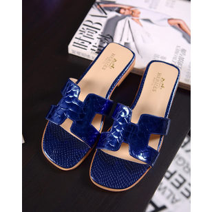 Blue patent leather slipper