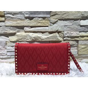 Jacquard rockstud clutch