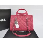 Chanel Original Fuchsia caviar leather handle bag