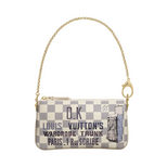 Louis Vuitton Milla Clutch Trunk