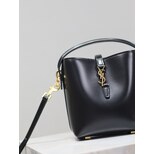 Yves Saint Laurent mini bucket bag featuring a metal CASSANDRE hook closure